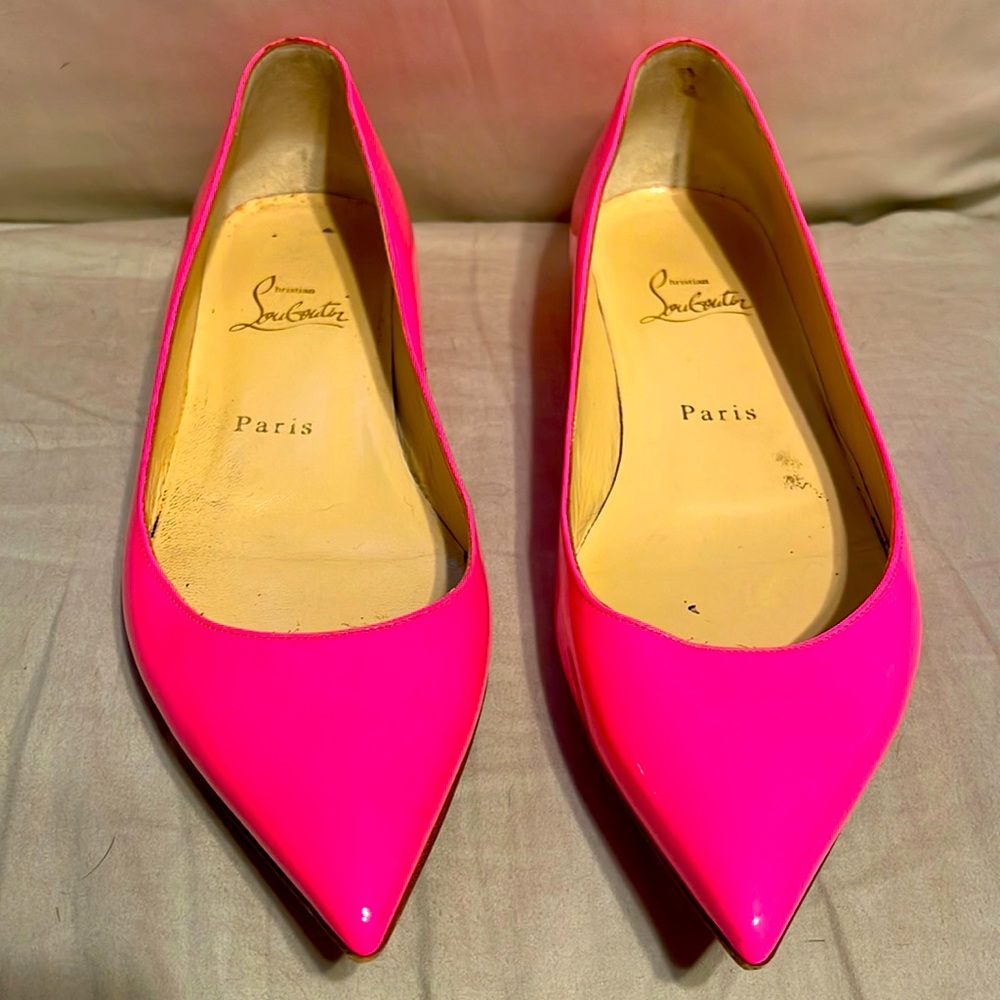 Pink heels from Christian Louboutin. Size 38. Worn a few times.
